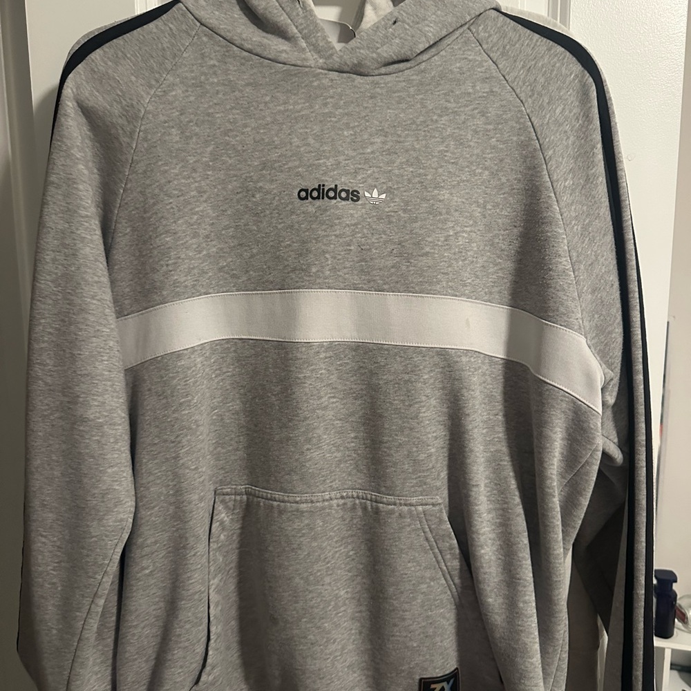 Grey men’s Adidas Hoodie.